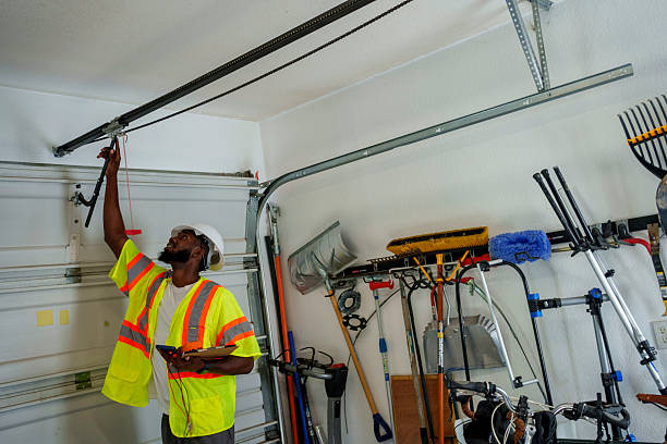 Professional Garage Door Repair technician working in International Falls, MN